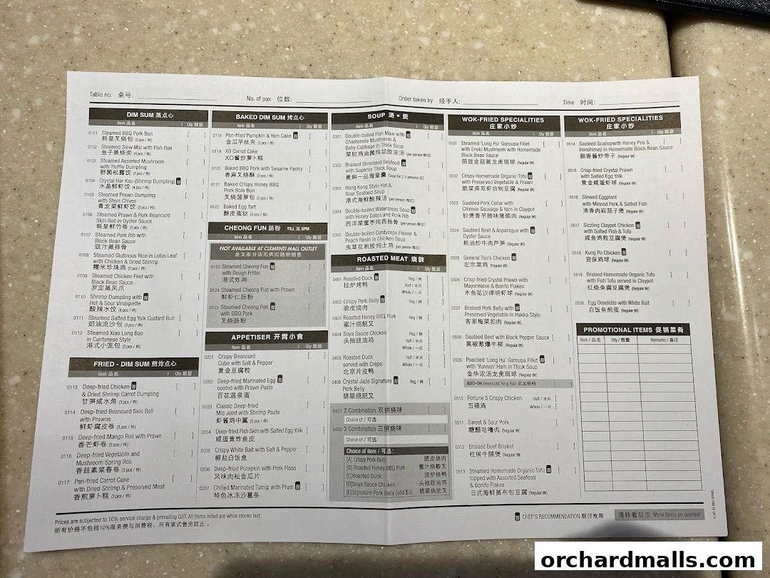 A menu from Crystal Jade Hong Kong Kitchen with various Chinese dishes listed.
