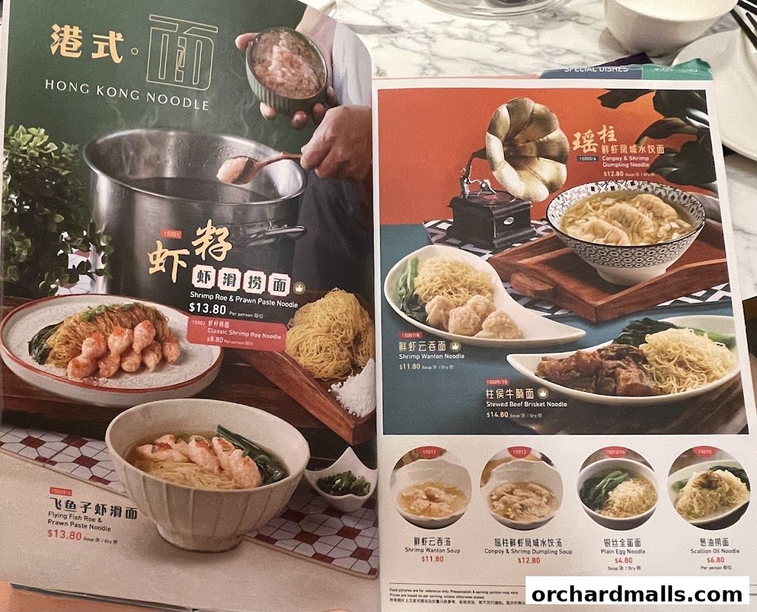 A menu from Crystal Jade Hong Kong Kitchen showcasing various noodle dishes and their prices.