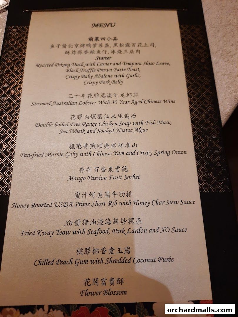 A menu from Crystal Jade Palace featuring Chinese dishes and desserts.