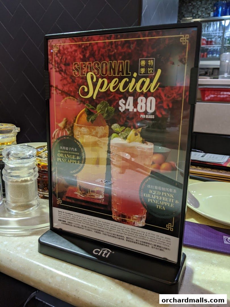 A sign advertising seasonal special drinks at Crystal Jade Palace.