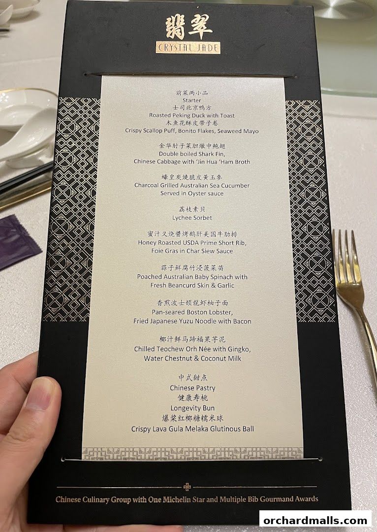 A menu from Crystal Jade Palace featuring Chinese culinary delights and awards.