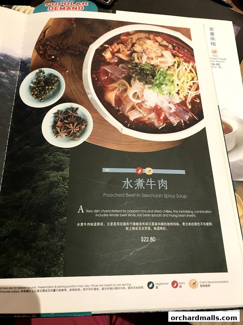 A menu page featuring a spicy Szechuan poached beef dish with detailed description and price.