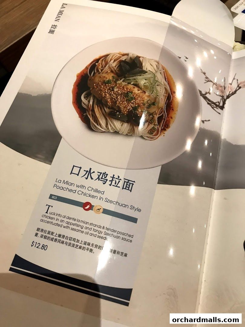A menu item featuring La Mian with Chilled Poached Chicken in Szechuan Style.