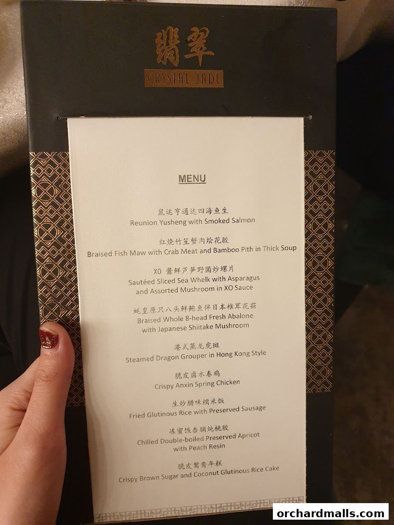 A menu from Crystal Jade Palace featuring various Chinese dishes.