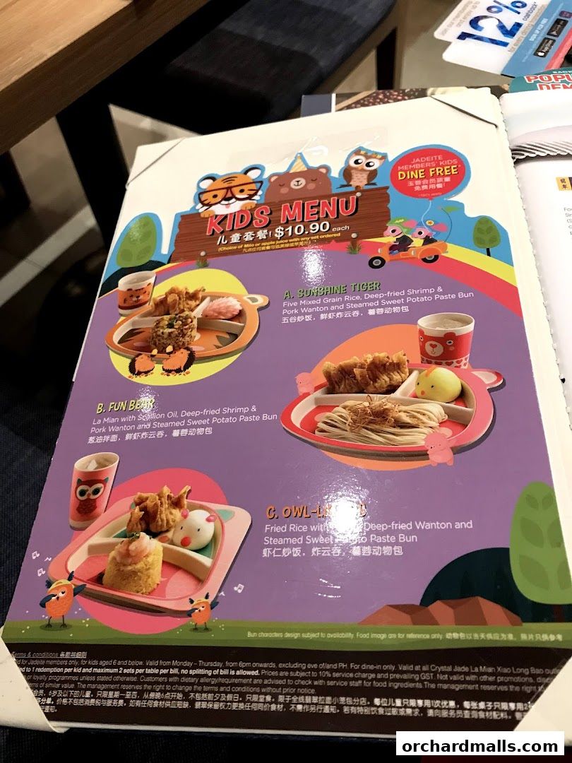 A kids' menu from Crystal Jade Palace featuring three meal options with cartoon characters.