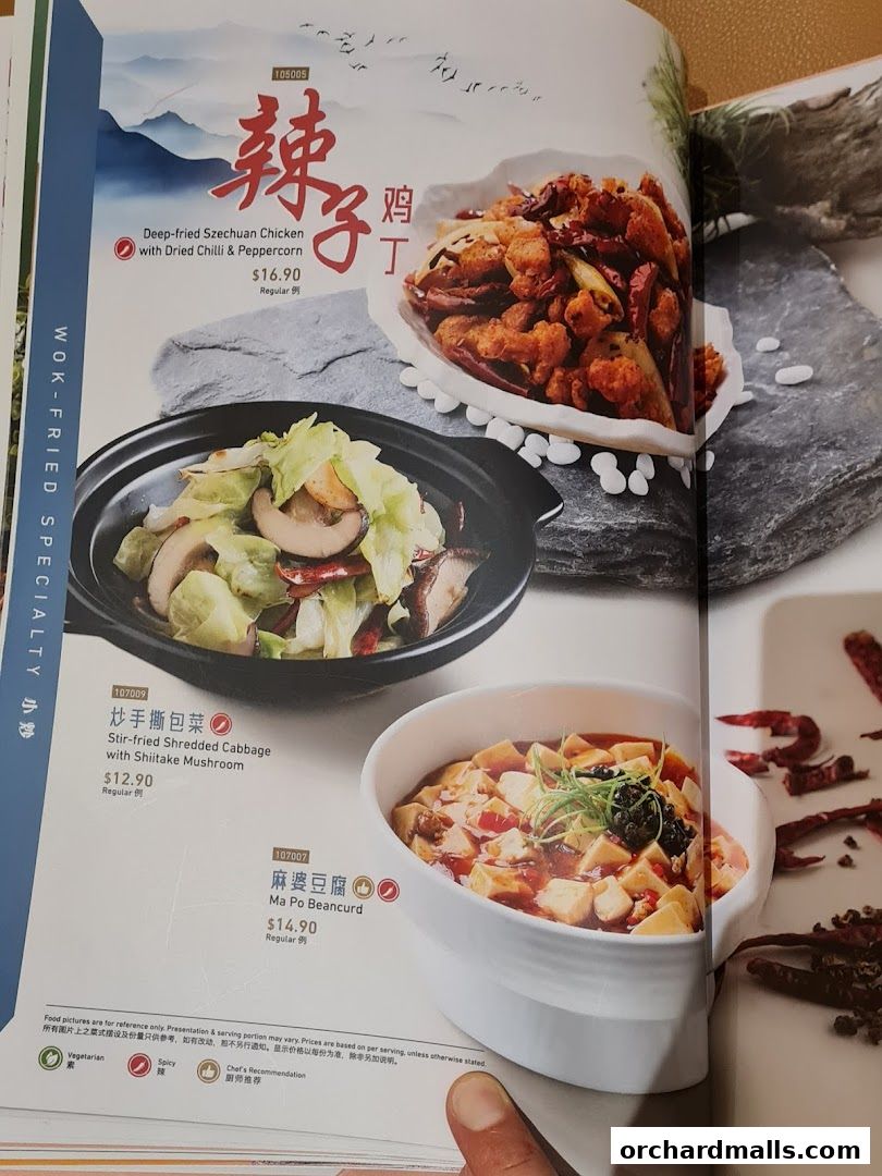 A menu page from Crystal Jade Palace featuring Szechuan Chicken, Cabbage, and Ma Po Beancurd.