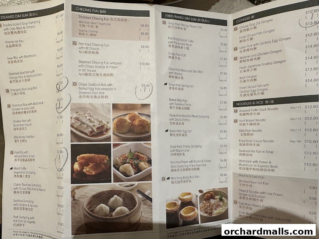 A menu from Crystal Jade Palace featuring dim sum, congee, noodles, and rice dishes.
