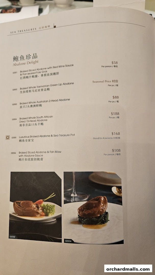 A menu page from Crystal Jade Palace featuring abalone dishes with prices and descriptions.