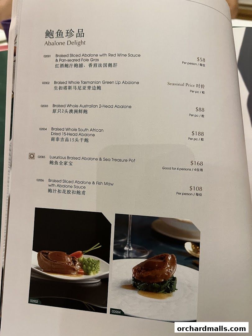 A menu page from Crystal Jade Palace featuring various abalone dishes with prices.