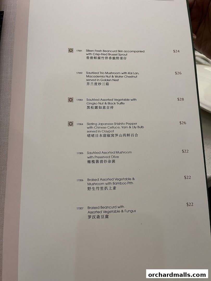 A menu page from Crystal Jade Palace featuring various vegetable and mushroom dishes.