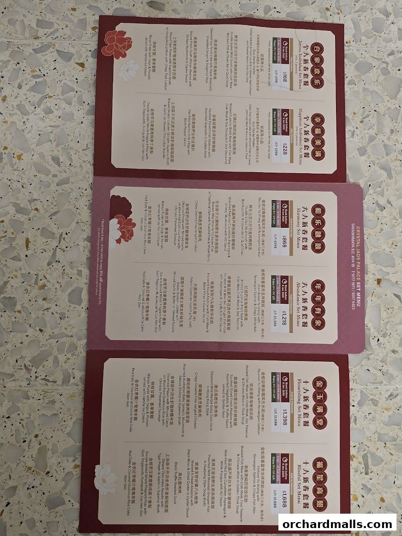 A menu for Crystal Jade Palace featuring various set menus with Chinese dishes and prices.