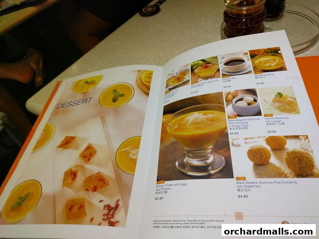 A menu page showcasing various dessert items with appealing food photography.