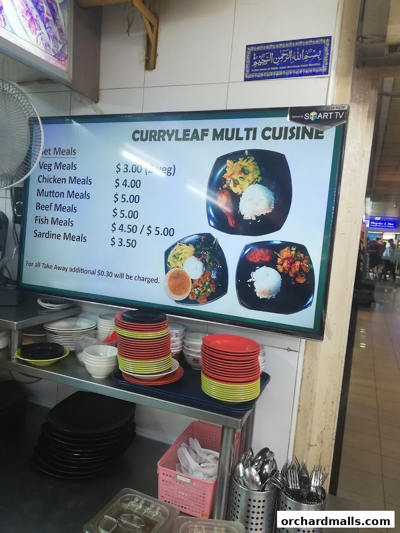 A digital menu board displays meal options and prices for Curryleaf Multi Cuisine.