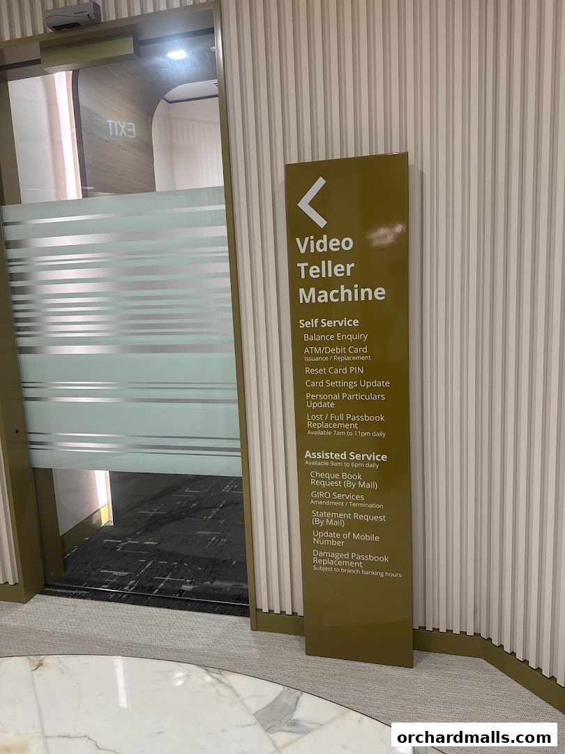 Signage for a Video Teller Machine with self-service and assisted service options.