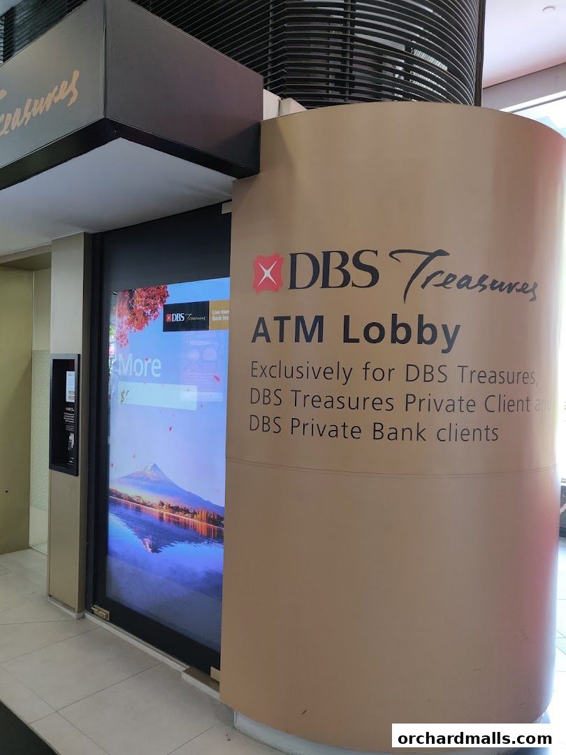 DBS Treasures ATM Lobby with a scenic mountain backdrop and exclusive client information.