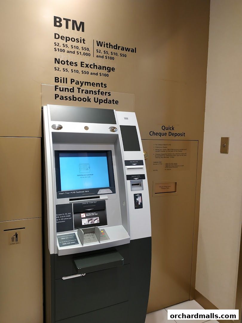 A DBS ATM machine offering deposit, withdrawal, exchange, bill payments, and fund transfers.
