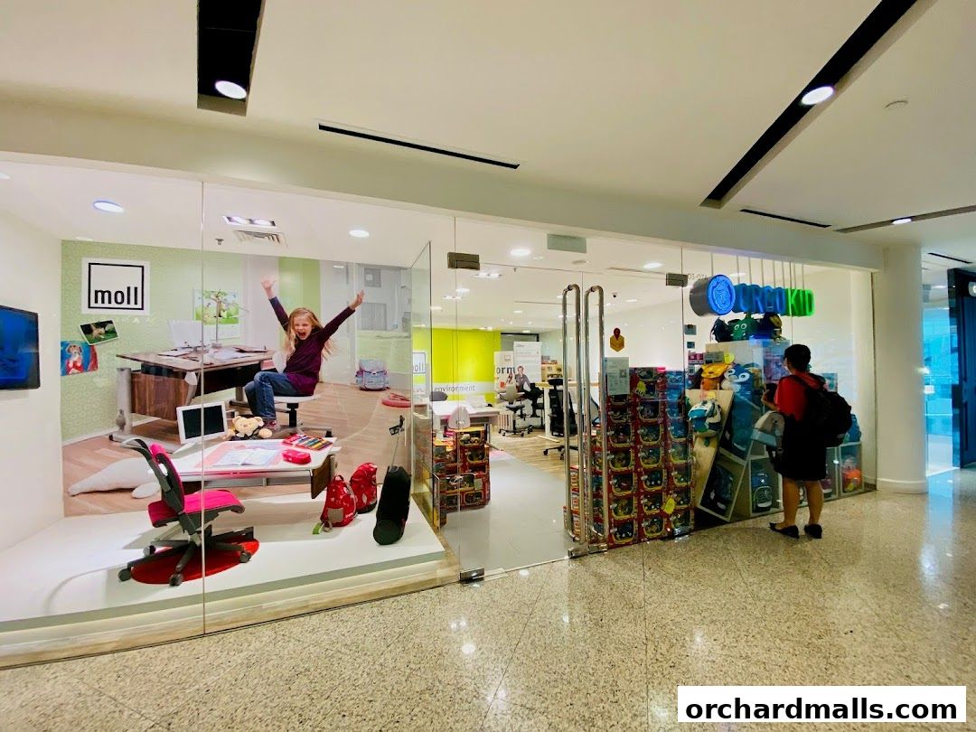 Shop front of Ergokid Wheelock Place, a DHL partner, showcasing children's furniture and school supplies.