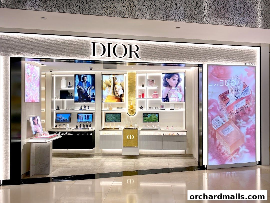 The elegant Dior Beauty boutique entrance showcases perfumes and beauty products with illuminated displays.