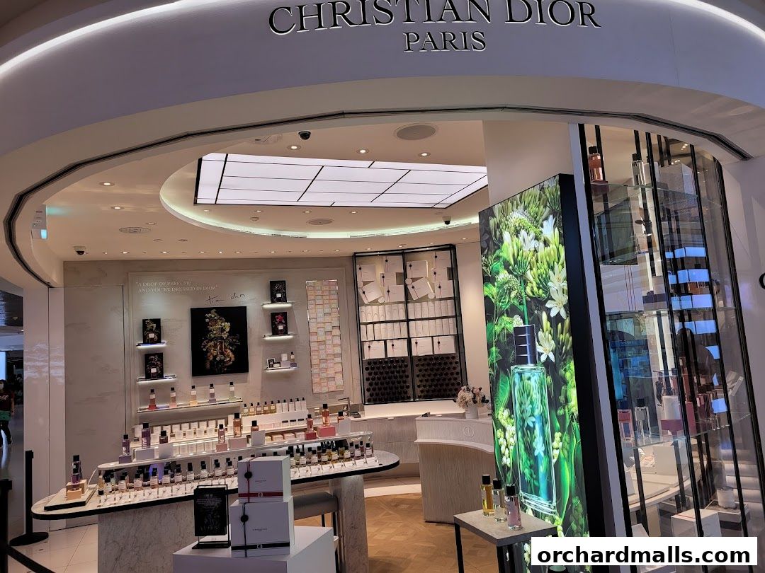 The elegant interior of a Dior Beauty boutique showcasing perfumes and gift sets.