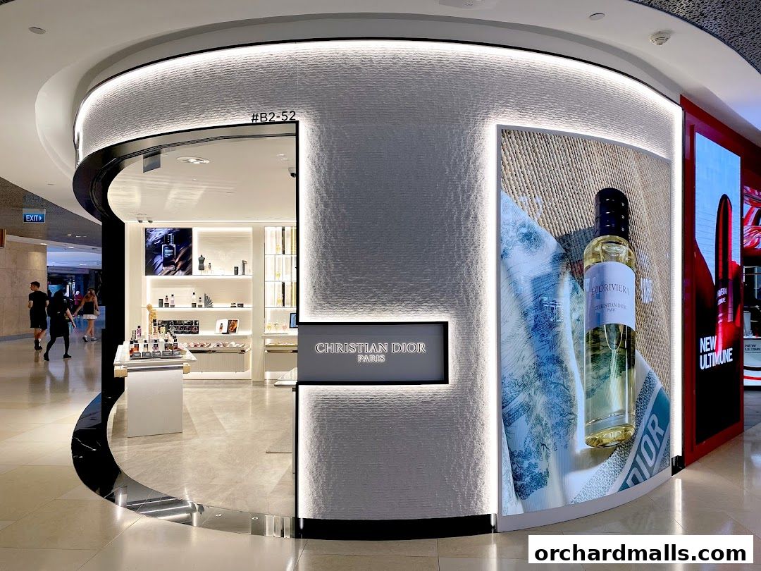 The elegant Dior Beauty boutique entrance with illuminated displays and products.