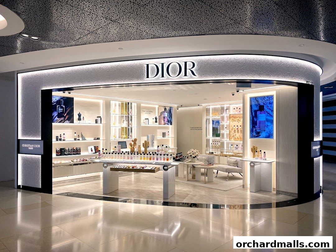 The elegant Dior Beauty boutique showcases a wide array of perfumes and beauty products on illuminated shelves.