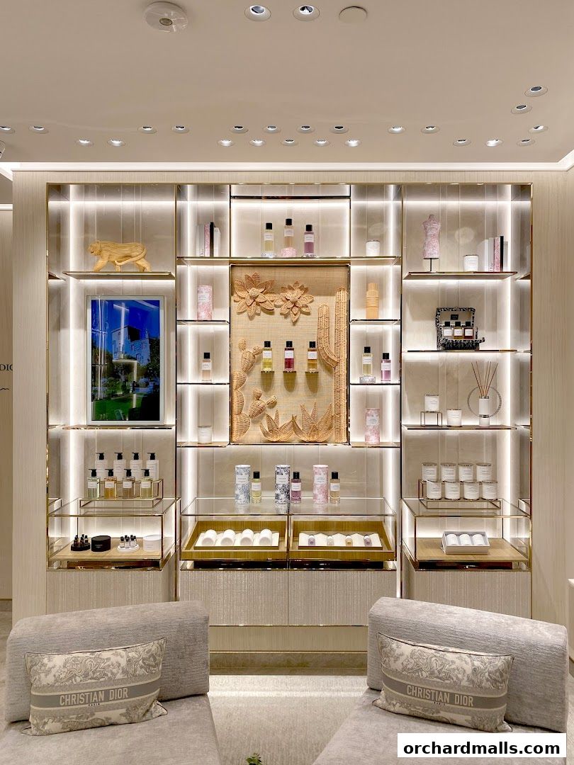 Luxurious Dior Beauty boutique interior showcasing fragrances and decorative items on illuminated shelves.