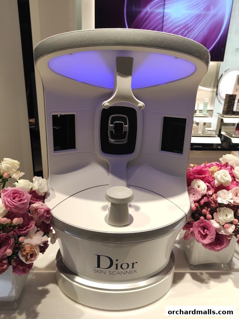 Dior Skin Scanner machine with floral arrangements in a retail store.