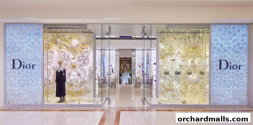 Dior Ngee Ann City storefront with elegant displays and butterfly motifs.