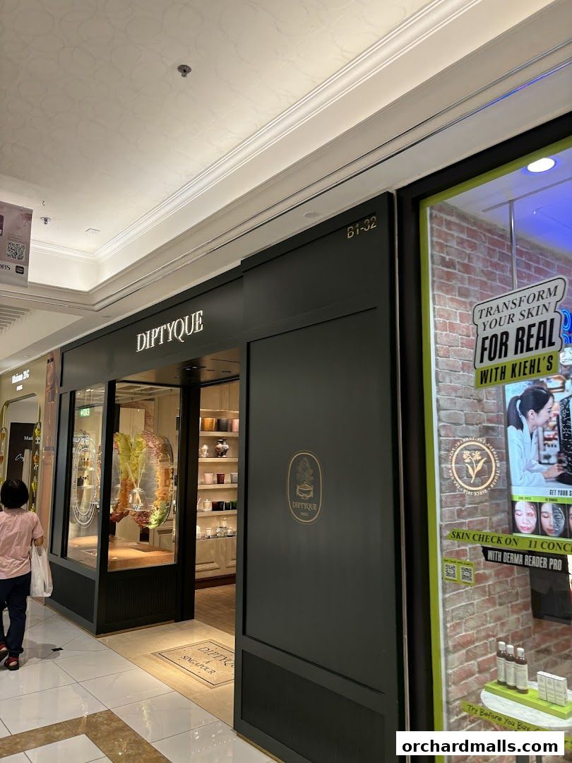 The Diptyque shop front with its elegant dark facade and display windows.