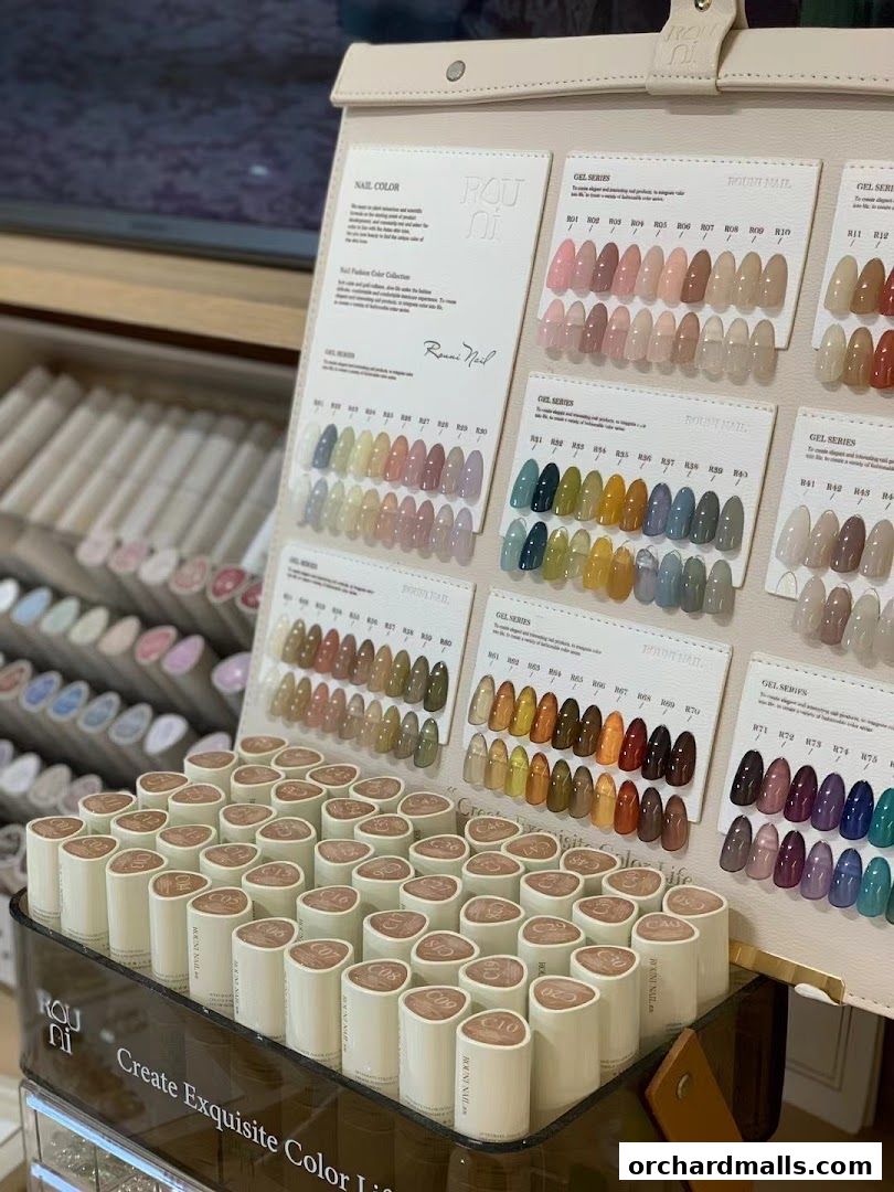 A display of various nail polish colors and gel series from Rouni Nail.