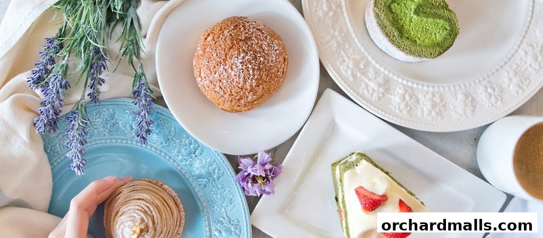 A delightful assortment of pastries and a cup of coffee, artfully arranged with lavender.