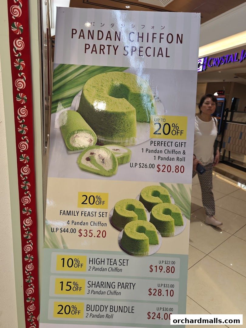 A promotional poster for Pandan Chiffon cakes and rolls with various set deals.
