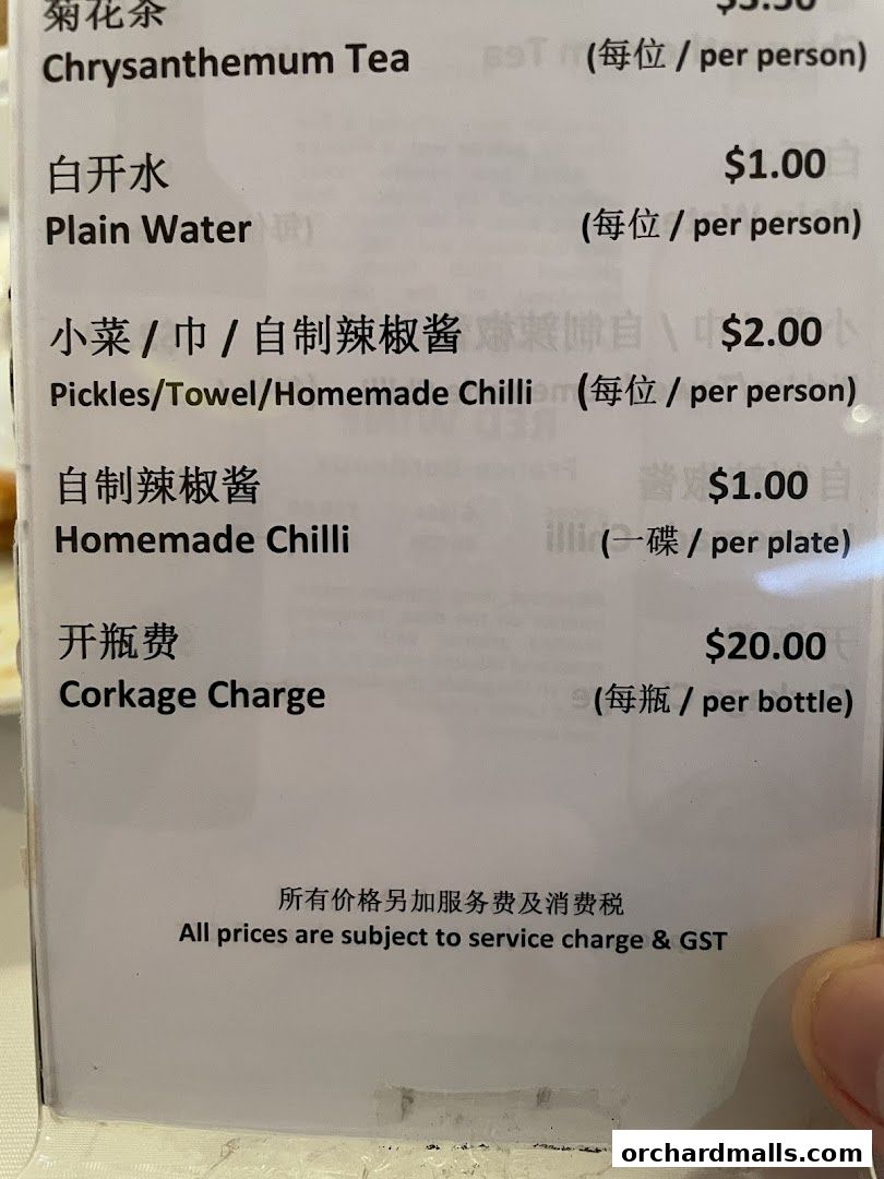 A close-up of a restaurant menu showing various food and drink items with prices.