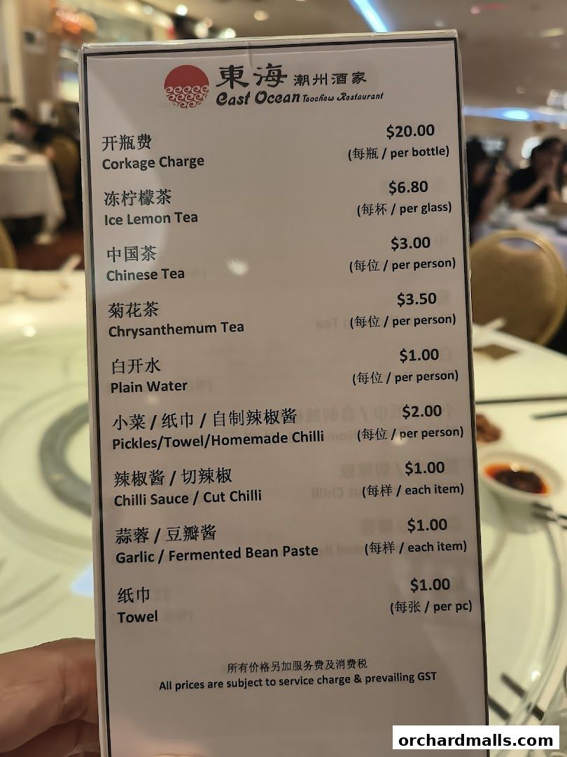 A menu from East Ocean Restaurant lists various drinks and condiments with prices.