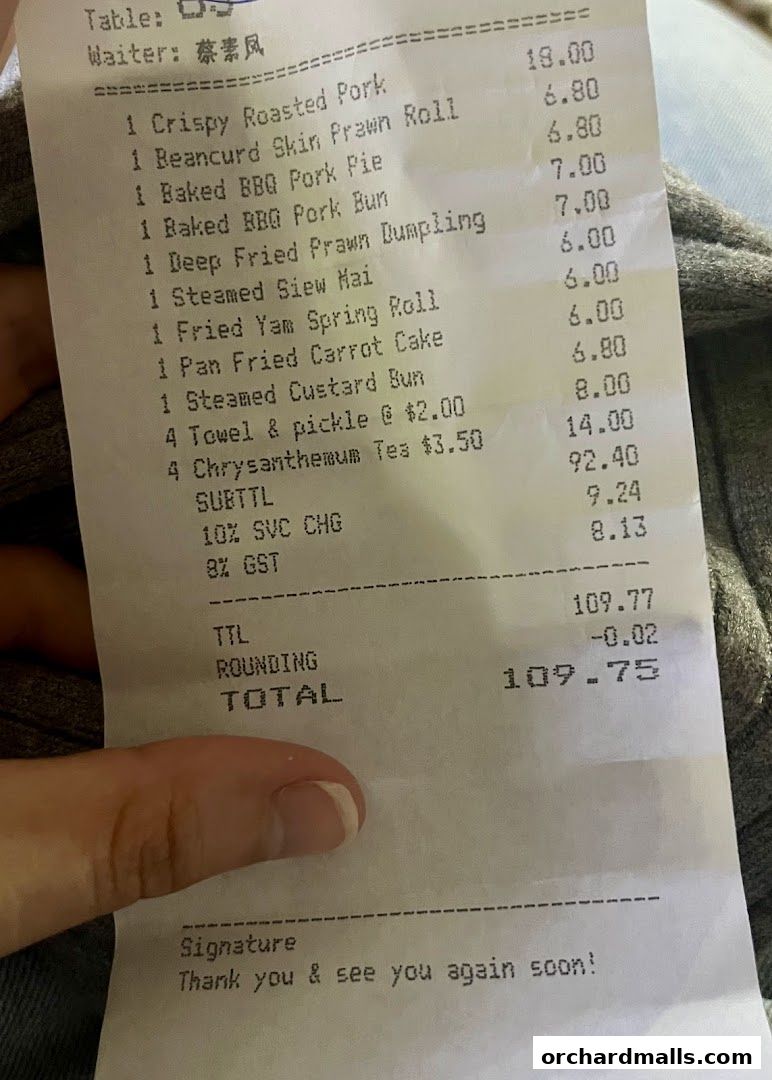 A receipt from East Ocean Restaurant detailing food and drink orders and their prices.