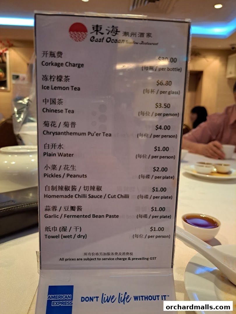 A menu from East Ocean Restaurant lists various food and drink items with prices.