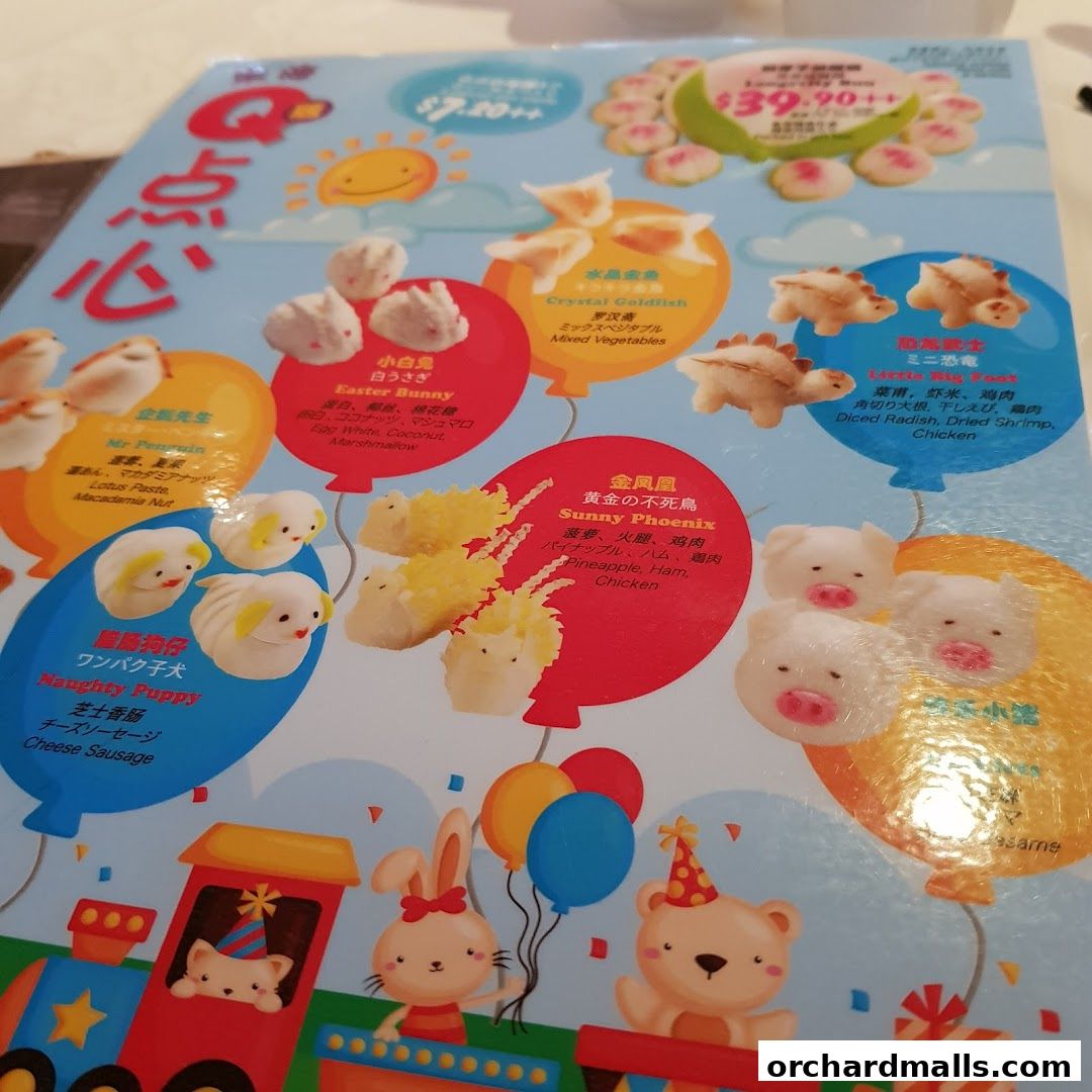 A colorful menu featuring various dim sum items shaped like animals and dinosaurs.