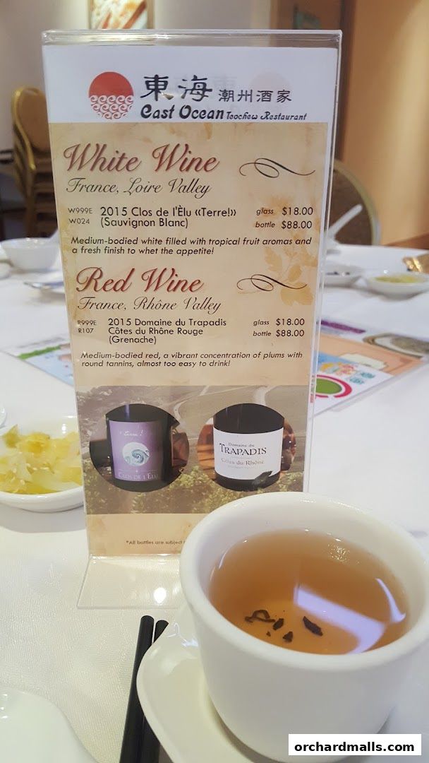 A menu for East Ocean Teochew Restaurant featuring white and red wines.