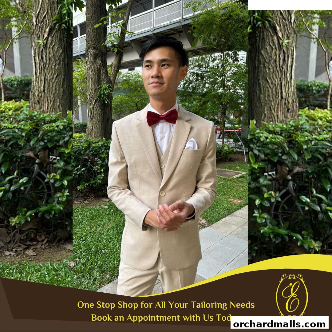 A man in a tan suit with a red bow tie stands outdoors, showcasing tailoring services.