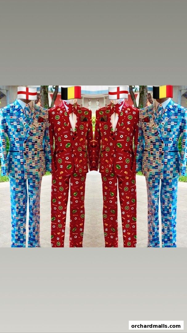 Mannequins dressed in patterned suits with national flags on their heads.