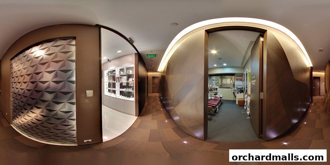 Interior view of a modern wellness clinic with treatment rooms and product displays.
