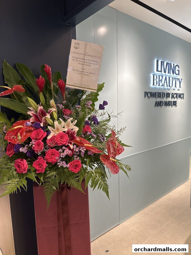 A floral arrangement congratulates the new Elemis London shop opening.
