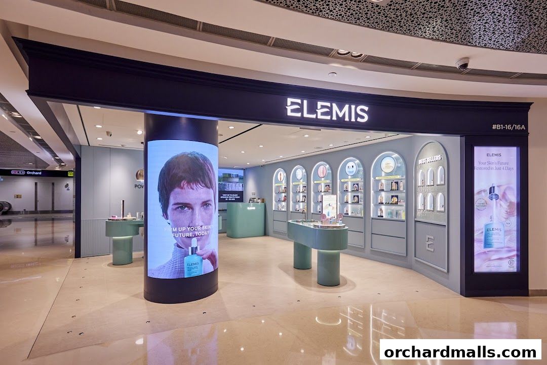 The Elemis London shop front features a large digital display and a well-lit interior showcasing skincare products.