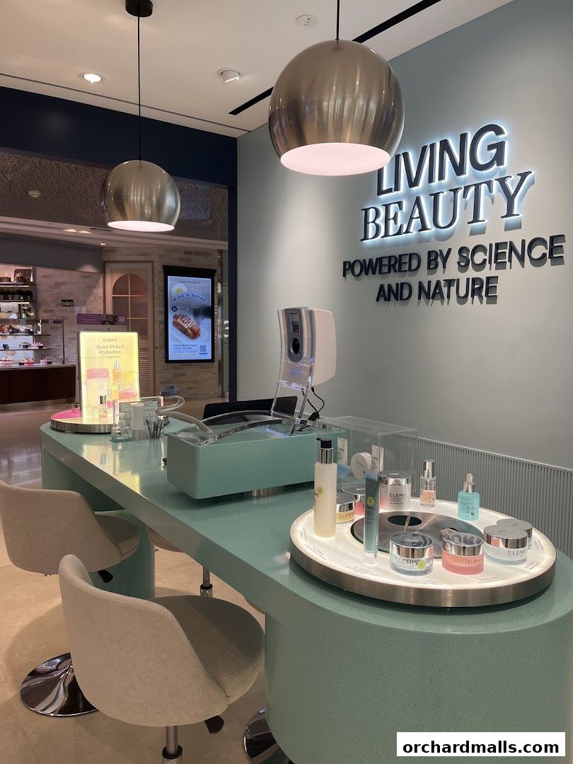 Interior shot of an Elemis London beauty counter with skincare products displayed.