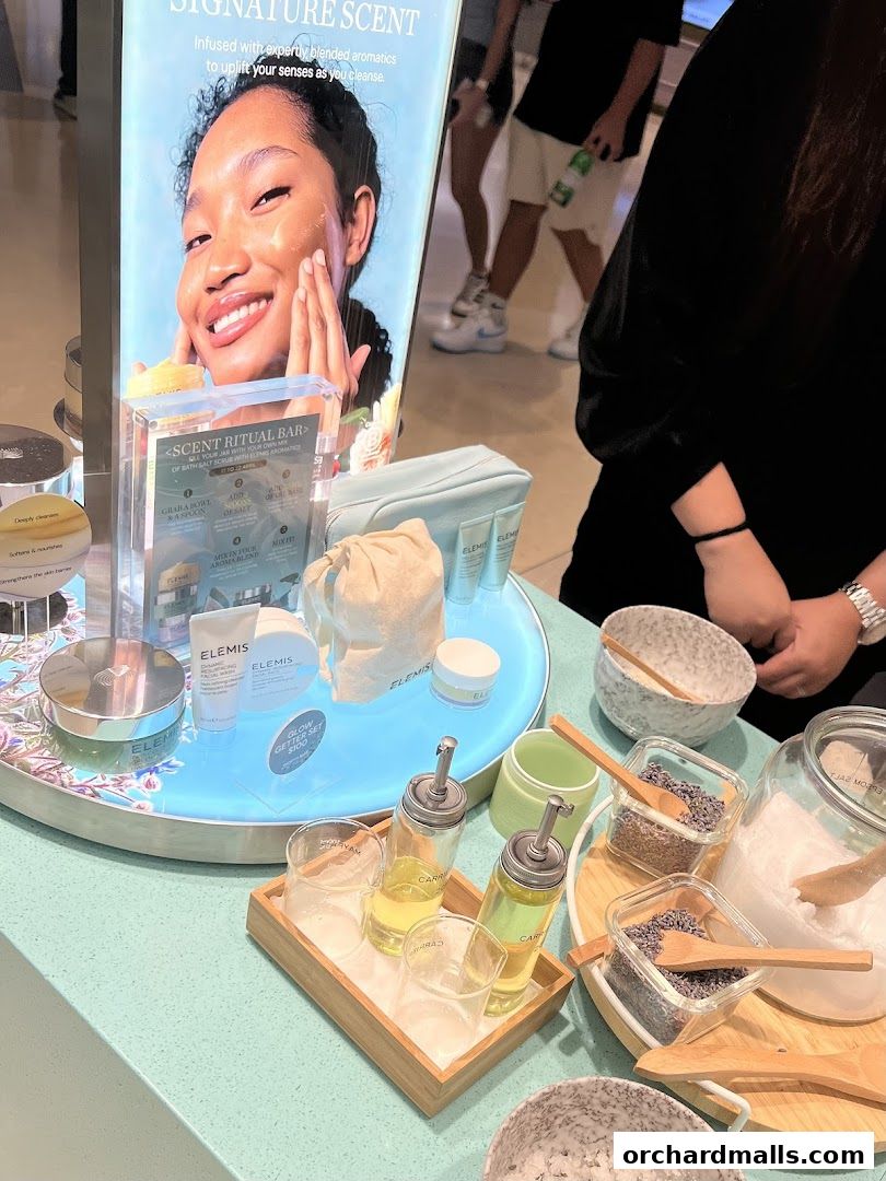 Elemis London display featuring skincare products and a scent ritual bar.
