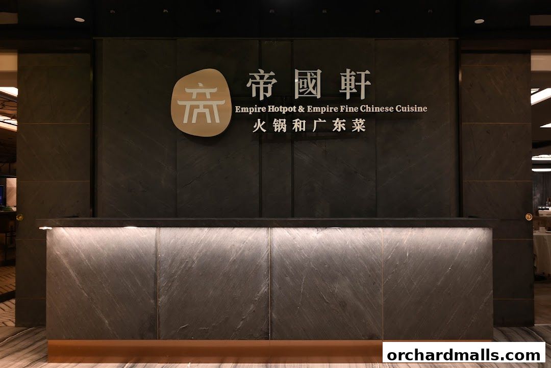 The entrance of Empire Hotpot & Empire Fine Chinese Cuisine with a modern reception desk.