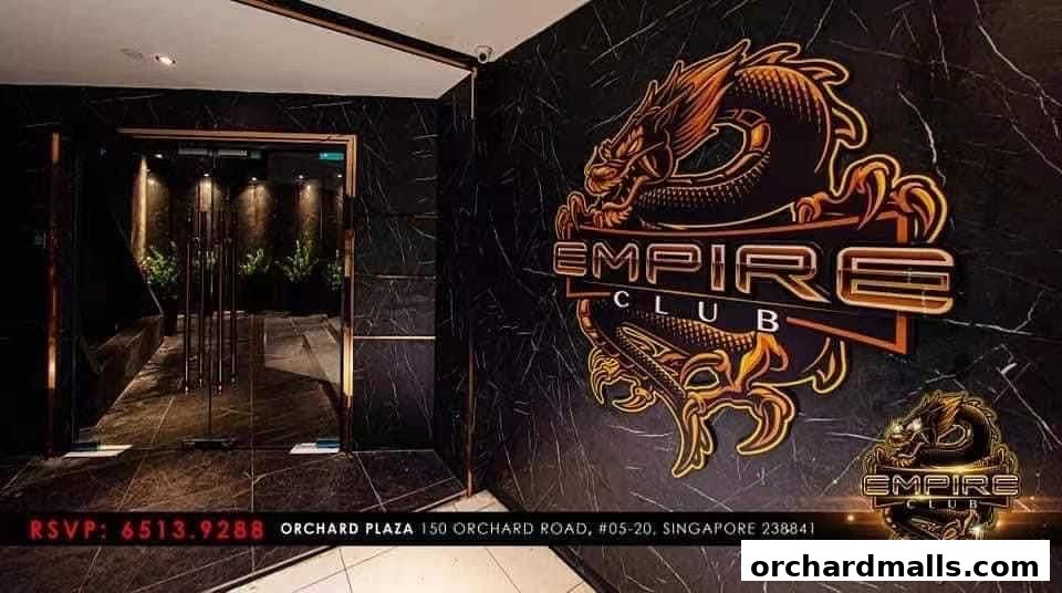 The entrance to Empire Club, featuring a large dragon logo and contact information.