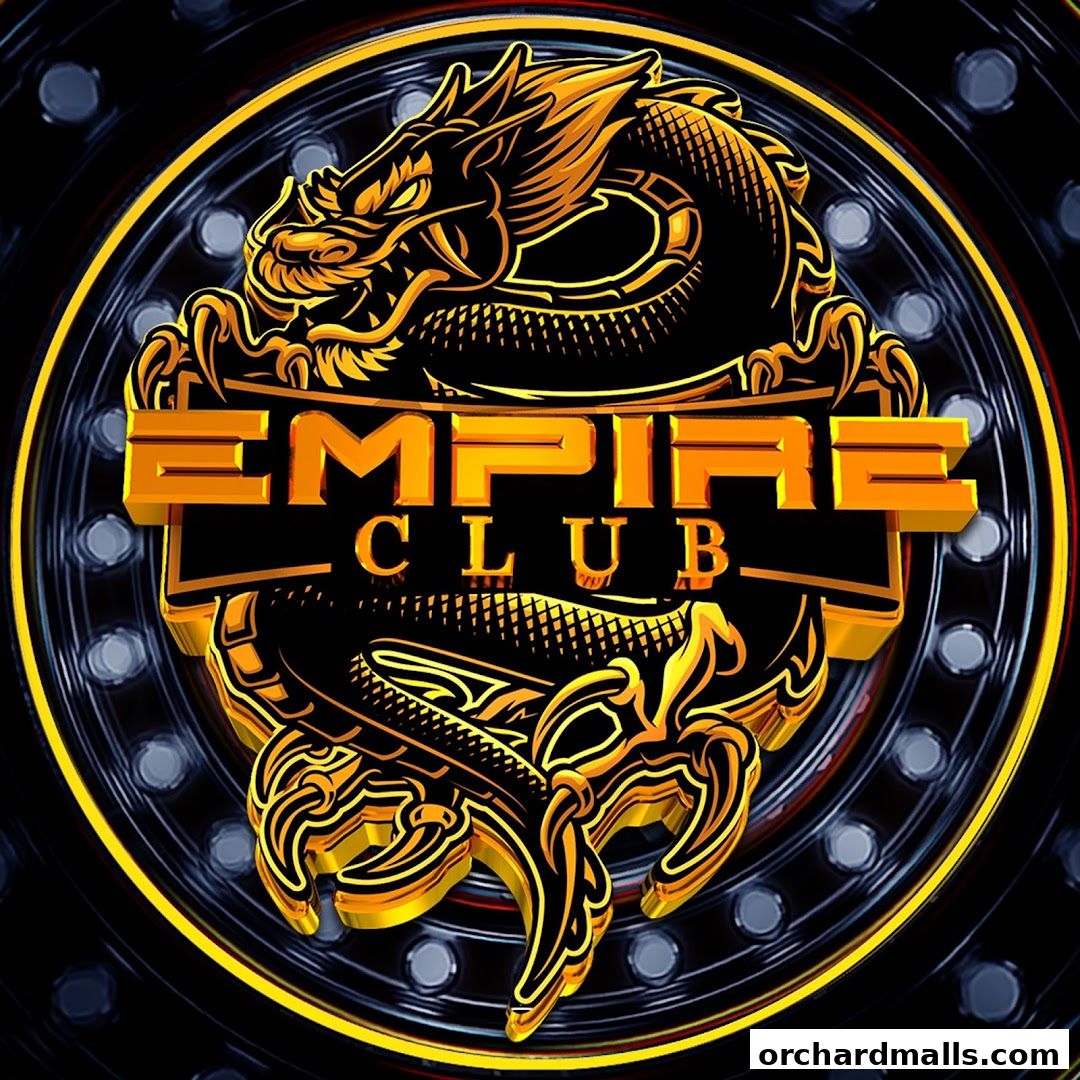 A golden dragon coiled around the 'Empire Club' logo with a circular, illuminated background.