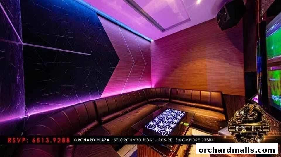 Luxurious KTV room with plush seating, ambient lighting, and a modern design.