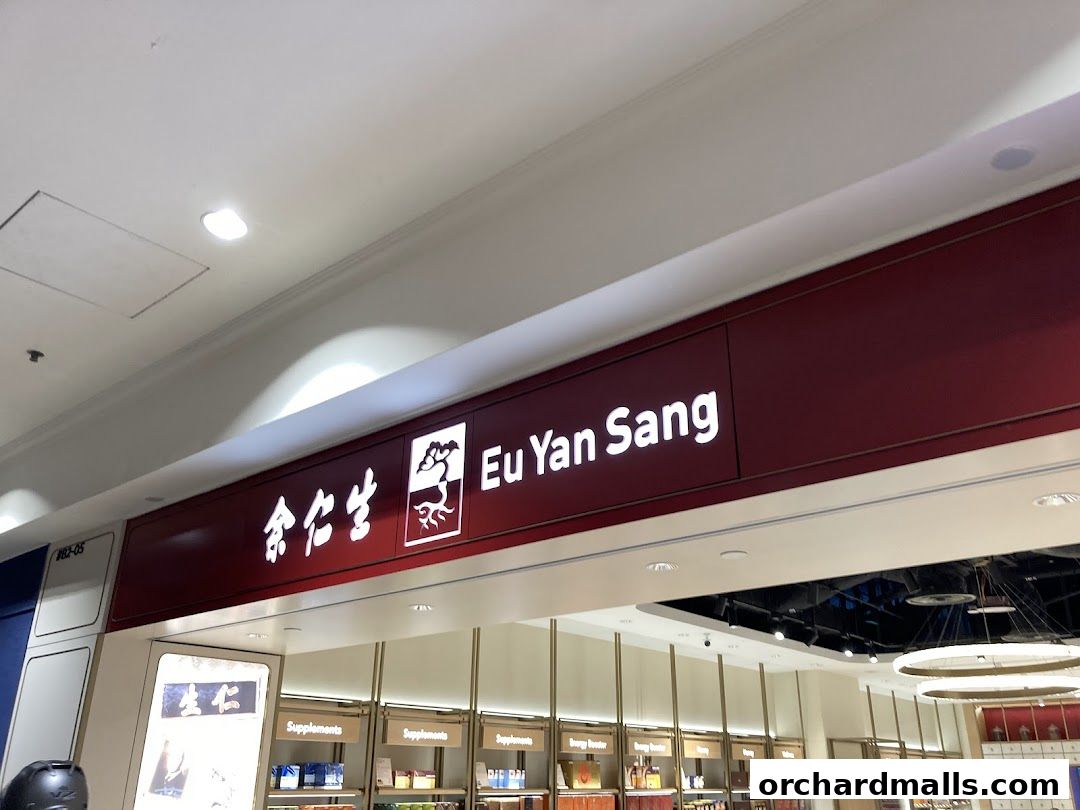The illuminated sign of Eu Yan Sang, a traditional Chinese medicine shop.